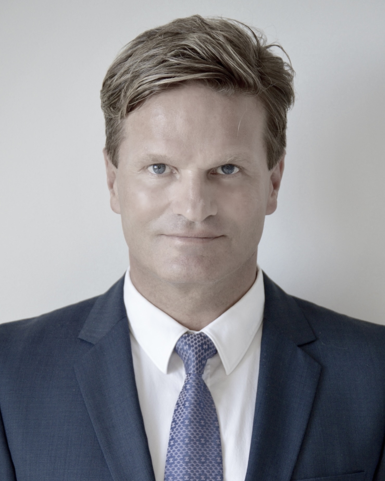 Professional portrait of Dr. Heiko Bailer, Ph.D., quantitative investment researcher and portfolio architect